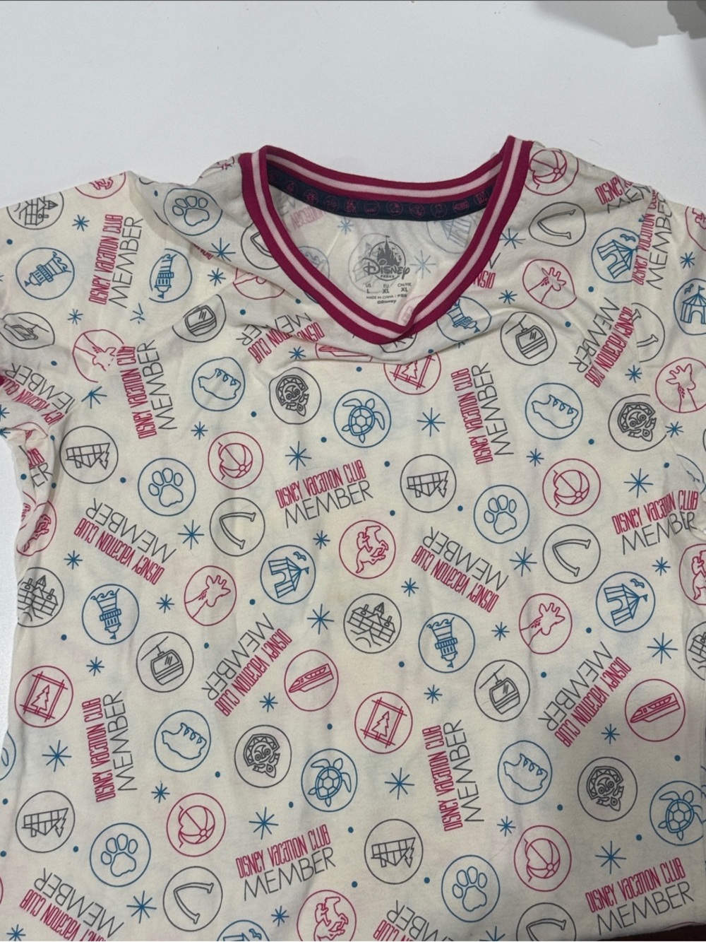 Disney Cream Short Sleeve V‑Neck Tee with Pink & Blue Trim and Graphic Print